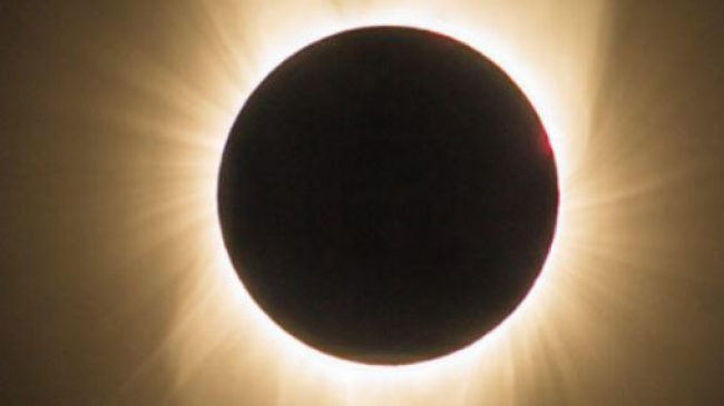 Total solar eclipse banner: April 8, 2024.